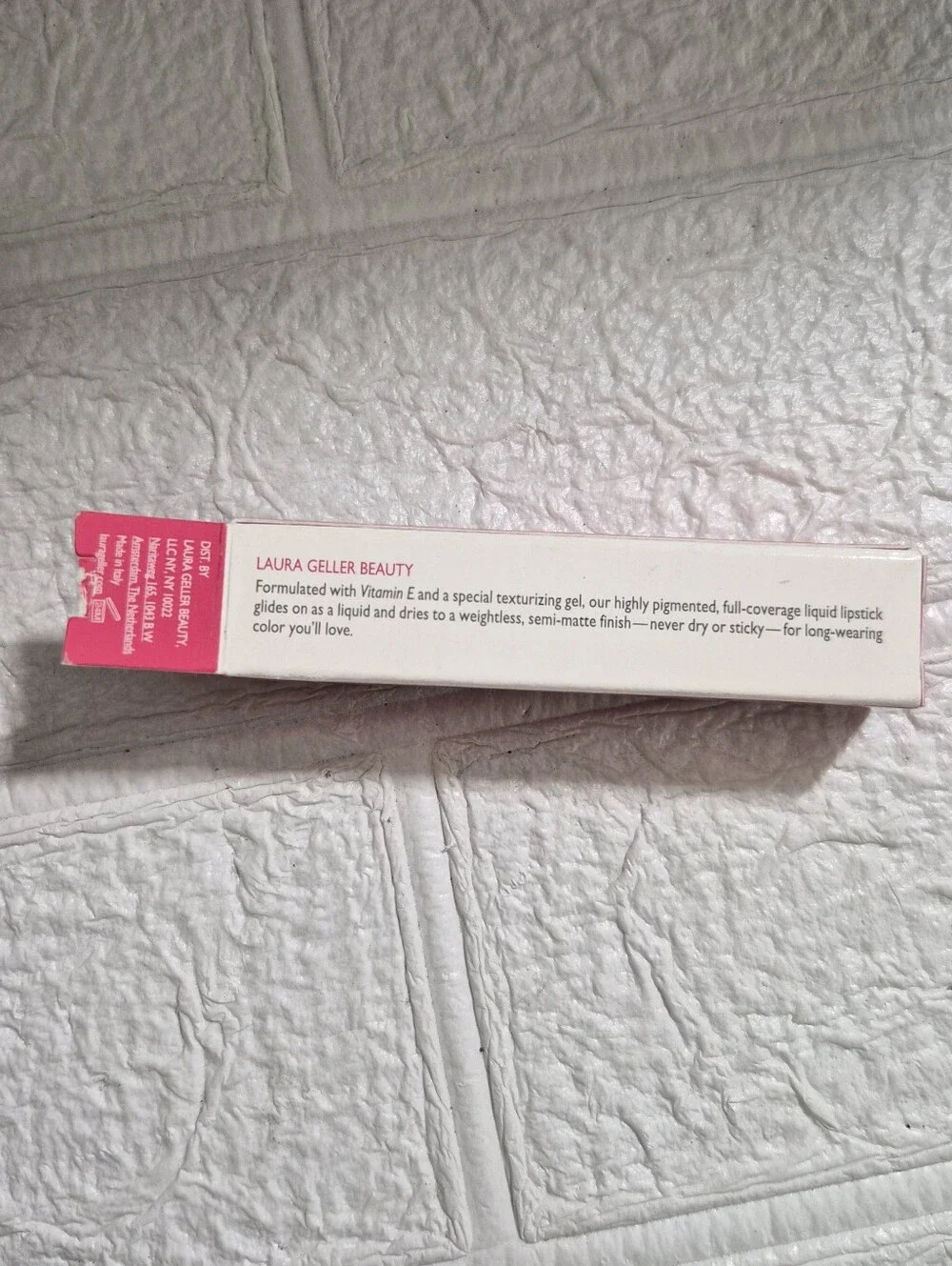 Laura Geller Luscious Lips Liquid Lipstick packaging in the shade Fuschia Fever